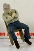 1264 MAN SLEEPING IN CHAIR-O