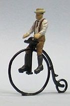 1616 MAN ON HIGH WHEEL BICYCLE-O